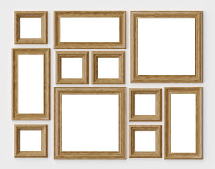 Wood photo or picture frames on white wall with shadows with cop