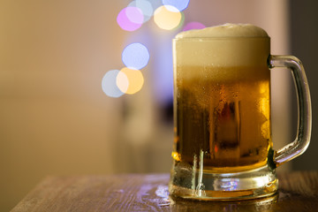 glass of beer and bokeh
