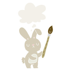 cartoon rabbit with paint brush and thought bubble in retro style