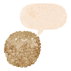 cartoon biscuit and speech bubble in retro textured style