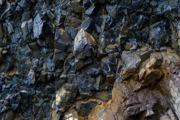 Closeup of black volcanic rock on Chios Island in Greece.