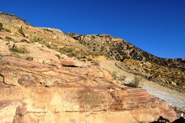 Fototapeta premium Red Stones with a Road to Dana Reserve- Jordan