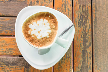 top view of hot coffee on wood table
