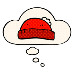 cartoon woolly hat and thought bubble in comic book style
