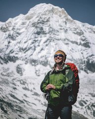 Fototapeta na wymiar Man standing on the top of the mountain. Nepal.