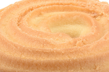 Macro shot of the surface of a round butter biscuit.