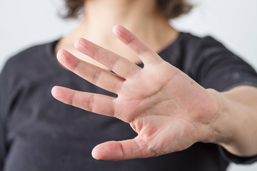 A woman making a self defense gesture