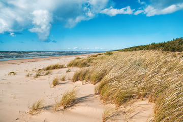 Beautiful seascape, Baltic Sea coast in Latvia, white sand and clouds
