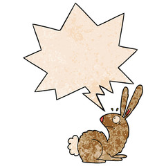 cartoon startled bunny rabbit and speech bubble in retro texture style