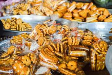 Cookies stuffed with milk cream, wrapped in plastic packs, snacks for leisure, focus selection