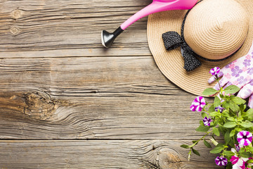 Top view of gardening tools on the wooden floor