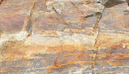 Texture of natural stone. Modern background. Image. Design for poster. Abstract backdrop. Black, grey, biege, sepia. Hole on the surface. Patterns and textures of rocks in nature. Closeup detail stone