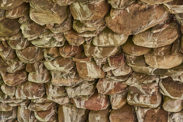 Fragment of the stonework of the bridge, colorful. Can be used as a background.