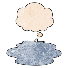 cartoon puddle of water and thought bubble in grunge texture pattern style