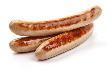 Fototapeta Grilled German pork sausages, Thuringer Rostbratwurst, close-up, isolated on white background obraz
