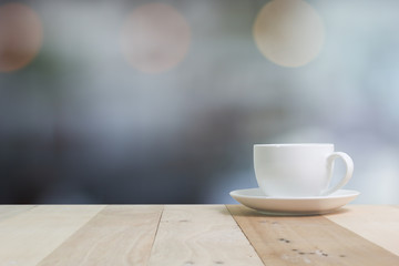 Hot Coffee cup  on the wooden table