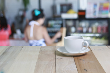 Hot Coffee cup  on the wooden table