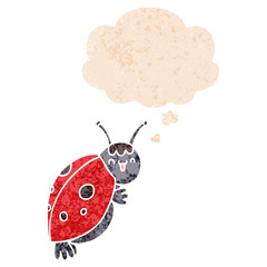 cute cartoon ladybug and thought bubble in retro textured style