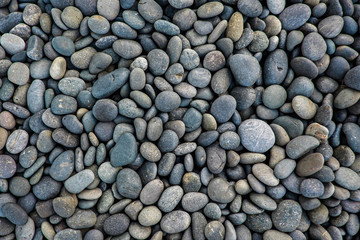 Pebbles stone texture and background. Abstract background made with stones.
