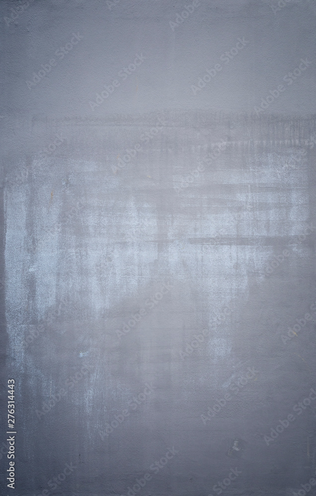 Poster high resolution full frame background of a concrete wall painted in gray with lighter marks as a res