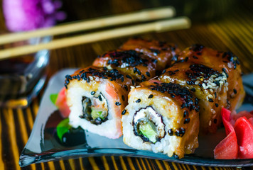 sushi rolls with red fish