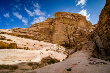 Fototapeta premium Desert with sandstone and granite rock in shape of boat in Wadi Rum in Jordan