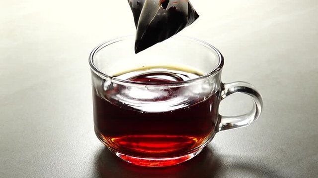 HD 1080p super slow Hot tea cup on a frosty winter day window background