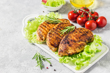 Balsamic rosemary grilled chicken breasts. Healthy dinner. Selective focus, space for text.
