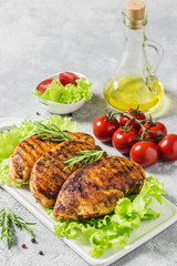 Balsamic rosemary grilled chicken breasts. Healthy dinner. Selective focus, space for text.
