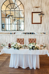 Festive wedding table setting. Empty wine glasses