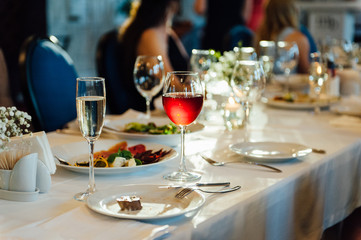 Festive wedding table setting. Empty wine glasses