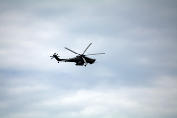 Fototapeta na wymiar helicopter gunship in the sky