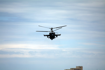 Fototapeta na wymiar combat helicopter attacks in the sky