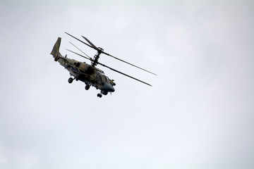 Fototapeta na wymiar helicopter gunship in the sky