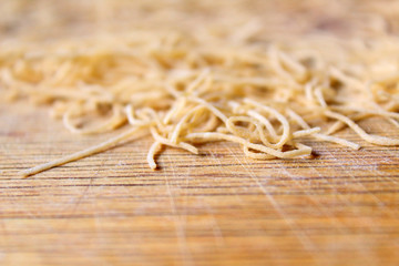 Homemade noodles for soup. Close-up. Background. Texture.