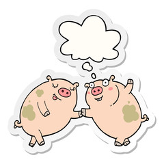 cartoon pigs dancing and thought bubble as a printed sticker