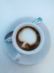 cup of coffee on plain background