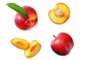 Nectarine with green leaf and slices isolated on white background. top view