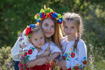 Mother and daughters in Ukrainian national dress