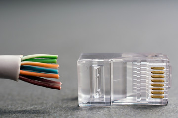 ethernet cable plug connector, network connection, on gray background