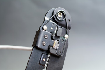 Champper Ethernet patch cable, Ethernet Network Cable Crimp Crimping Crimper Tool, close up gray...