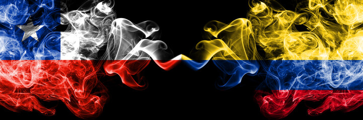 Chile vs Colombia, Colombian smoky mystic flags placed side by side. Thick colored silky smokes combination of Colombia, Colombian and Chilean flag