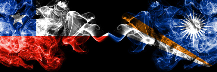 Chile vs Marshall Islands smoky mystic flags placed side by side. Thick colored silky smokes combination of Marshall Islands and Chilean flag
