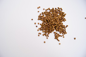 pile of flax seeds isolated on white background