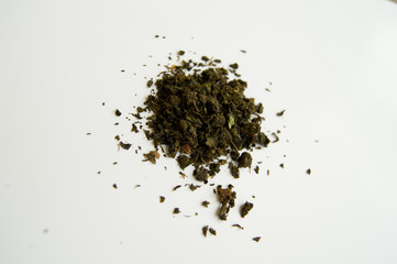pile of green tea isolated on white background