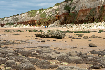 Fototapeta na wymiar Remains of a shipwreck on the beach at Hunstanton, Norfolk, UK
