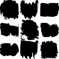 Set of grunge spots black on white background.