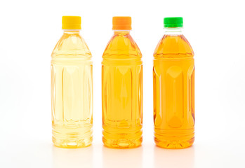 bottle of ice tea and green tea on white background