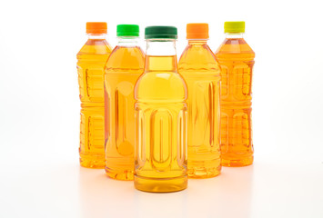 bottle of ice tea and green tea on white background
