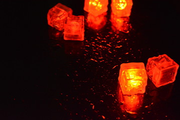 Original bright red glowing plastic cubes in total darkness. Awesome background, hellish and creepy...